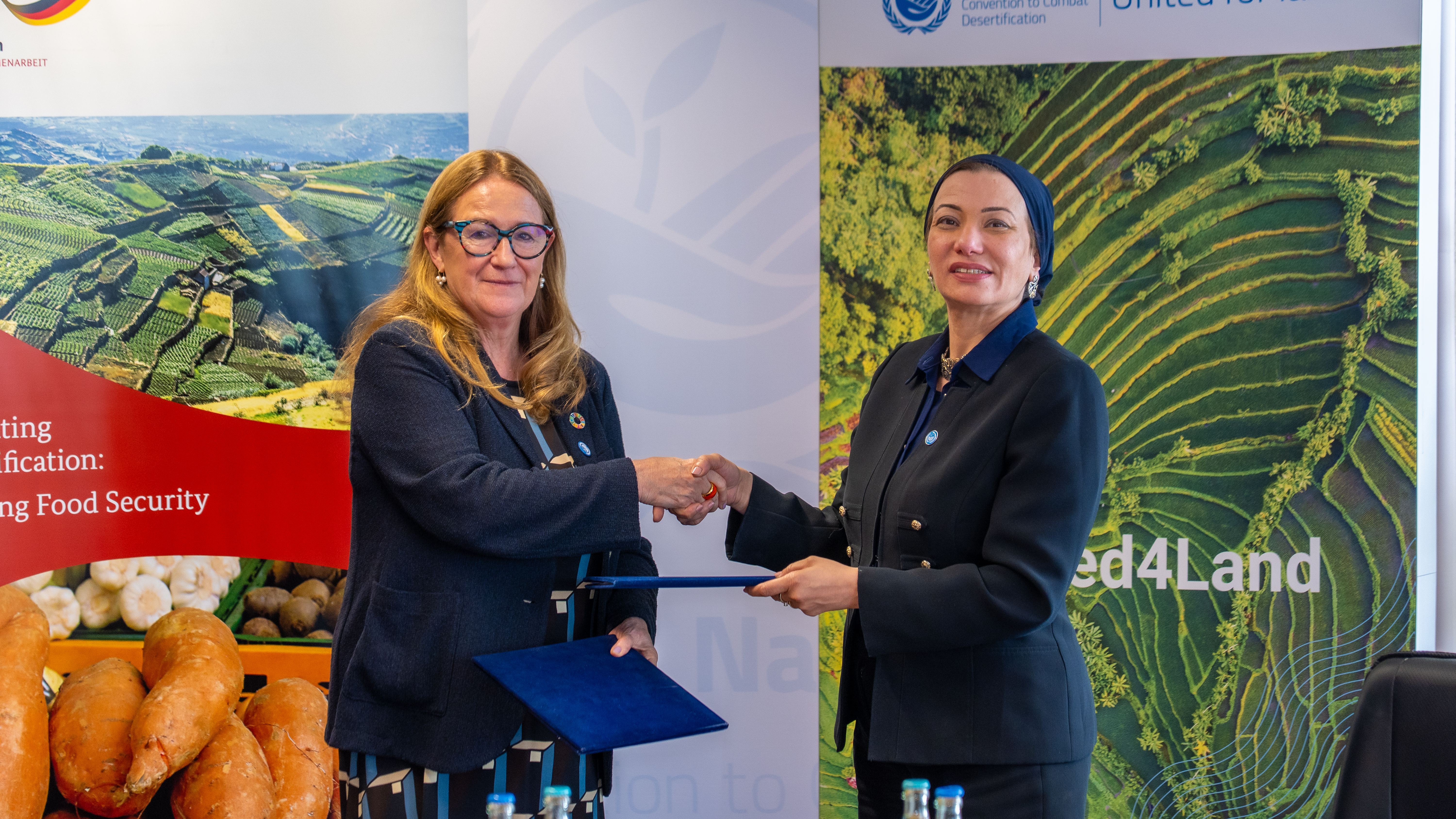 Handshake between Executive Secretary Yasmine Fouad and Ingrid Gabriela Hoven from GIZ